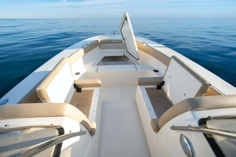 Slide: The Image of 2023 Scout 195 Sport Dorado boat interior on calm ocean water. - 3