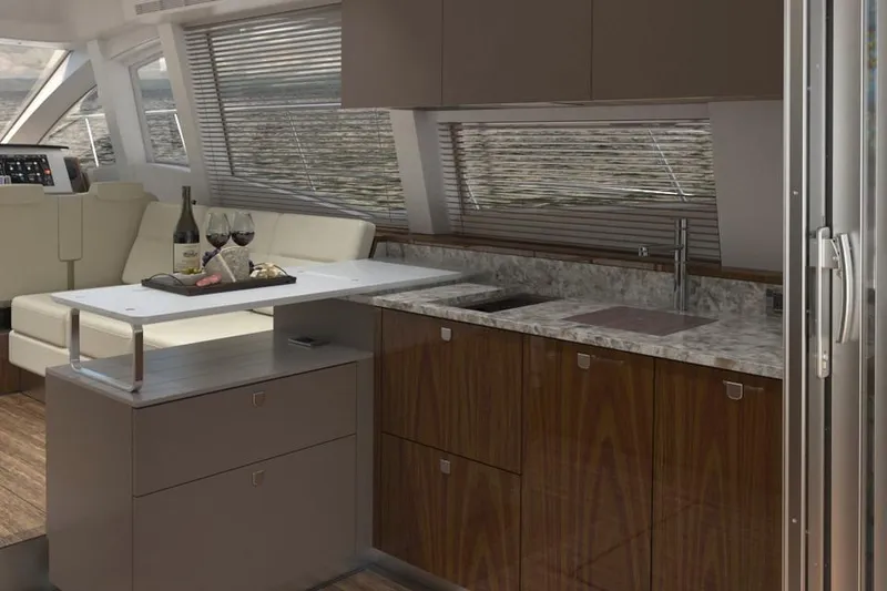 Slide: The Image of Luxurious interior of 2018 Sea Ray Fly 520 yacht with modern kitchen and seating area. - 6