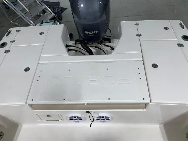 Slide: The Image of 2026 Robalo 226 Cayman boat deck with Yamaha 200 engine, white finish. - 12