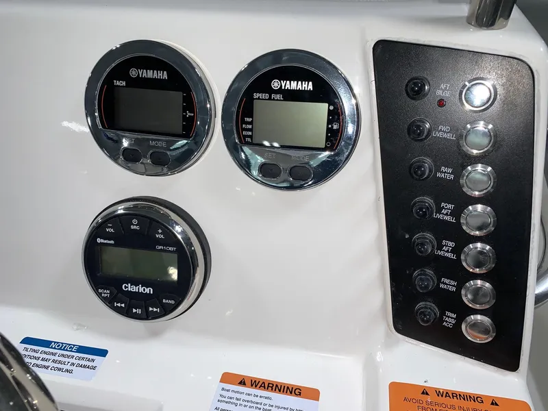 Slide: The Image of Dashboard of 2026 Robalo 226 Cayman with Yamaha gauges and Clarion audio system. - 17