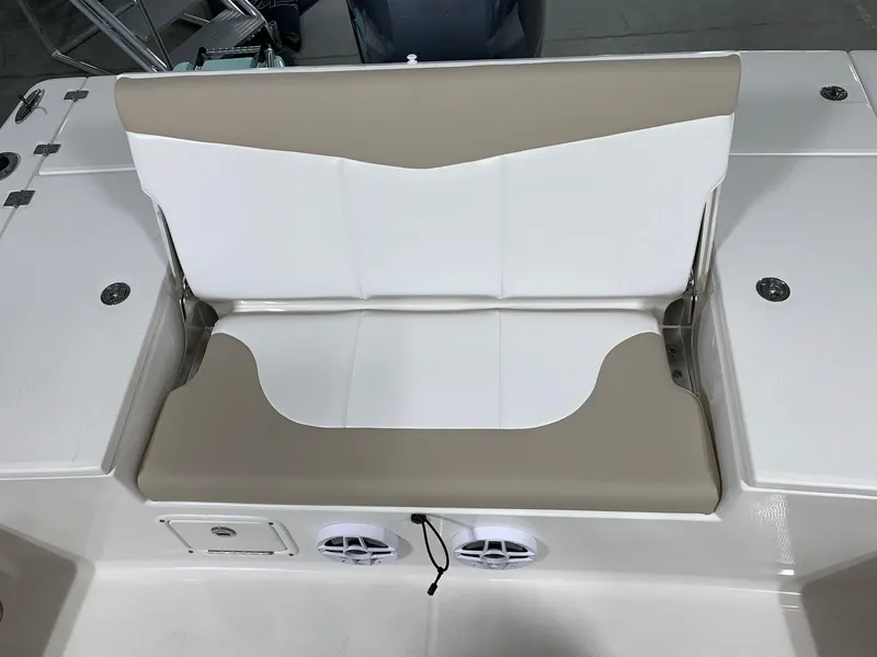 Slide: The Image of 2026 Robalo 226 Cayman boat seat with beige and white upholstery. - 11