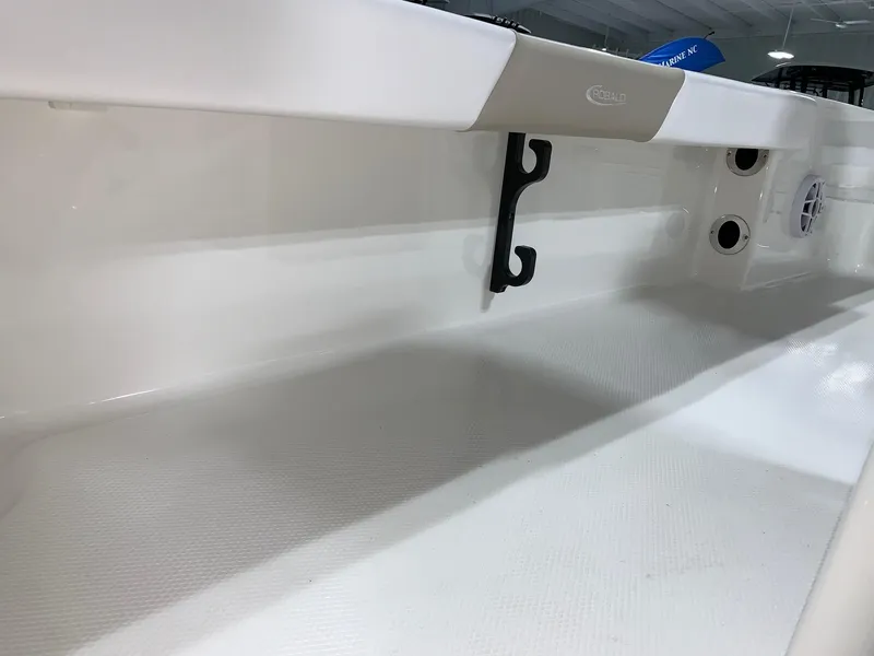 Slide: The Image of 2026 Robalo 226 Cayman boat interior with sleek white finish and modern design features. - 14