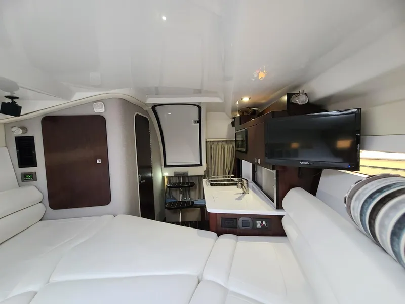 Slide: The Image of Interior of 2018 Monterey 295 Sport Yacht with modern amenities and sleek design. - 12