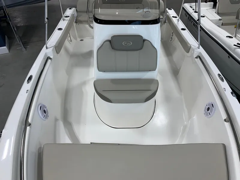 Slide: The Image of 2024 Key West 189 FS boat interior with seating and storage compartments. - 3