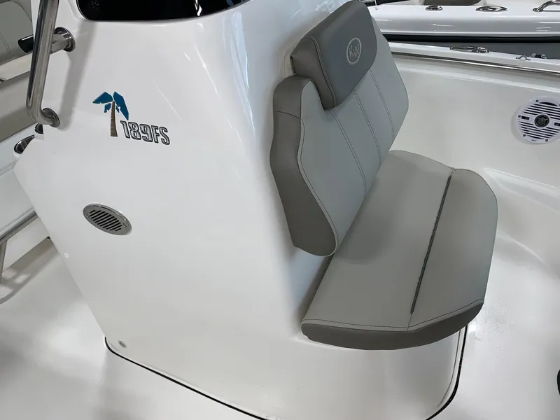 Slide: The Image of 2024 Key West 189 FS boat with gray seating and console. - 13