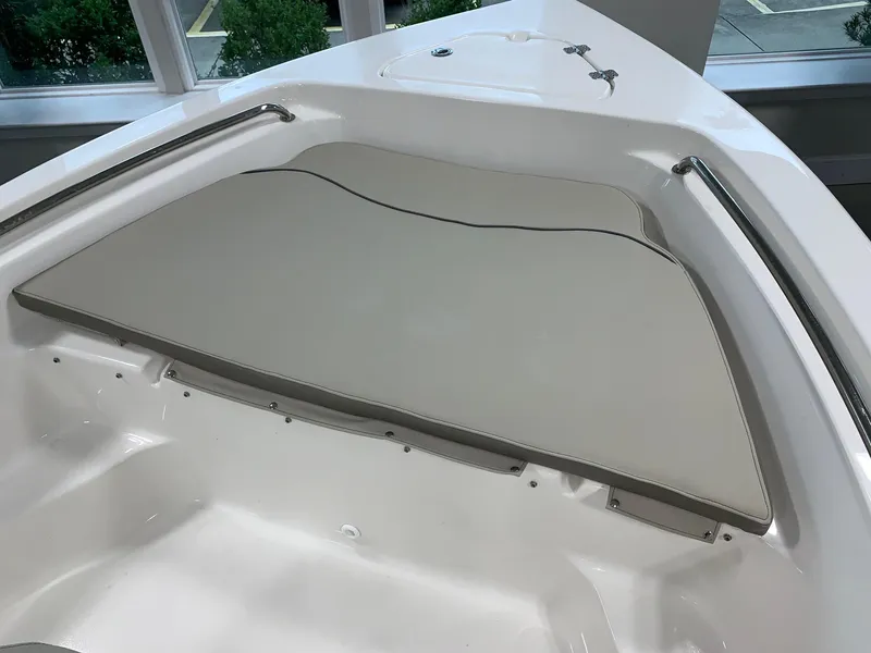 Slide: The Image of 2024 Key West 189 FS boat bow seating area with cushioned seats. - 16