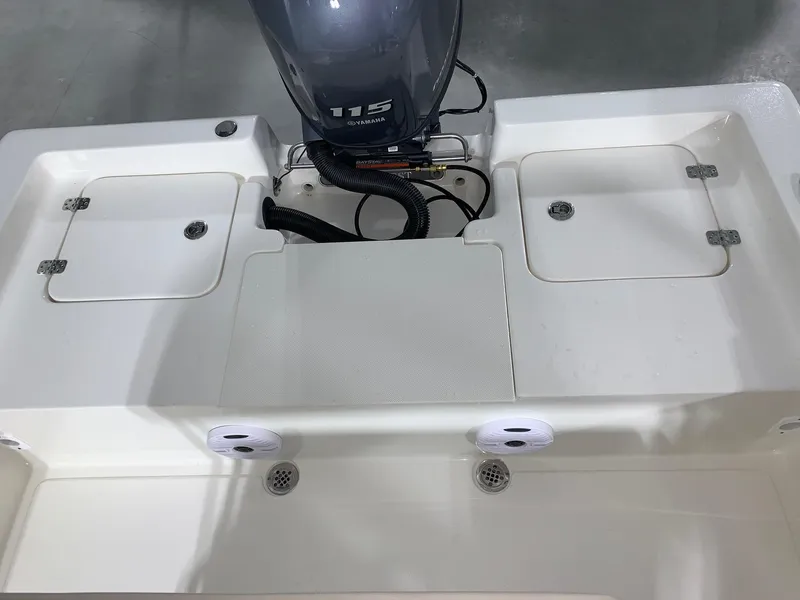 Slide: The Image of 2026 Key West 188 Bay Reef boat deck with Yamaha 115 engine. - 12