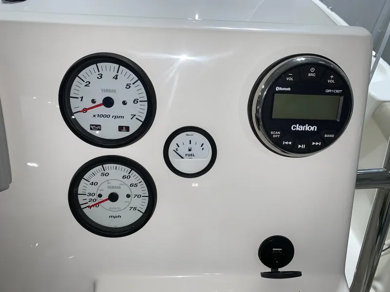Slide: The Image of Dashboard of 2026 Key West 188 Bay Reef boat with gauges and Clarion audio system. - 14