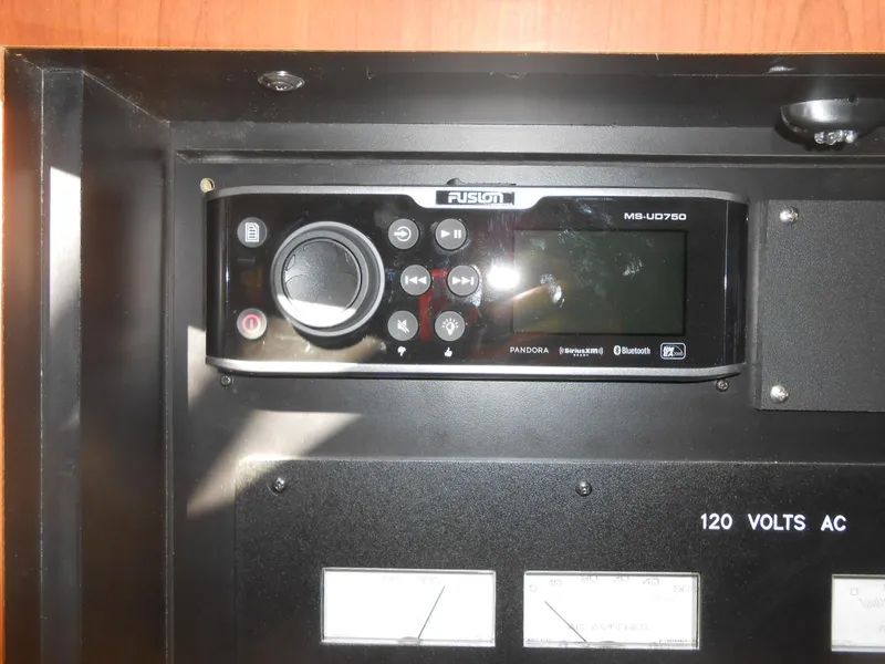 Slide: The Image of Fusion MS-UD750 stereo system on 2005 Sea Ray 420 Sundancer control panel. - 24