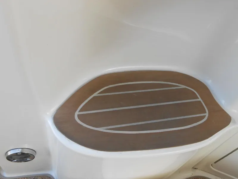 Slide: The Image of 2005 Sea Ray 420 Sundancer boat step with wood finish detail. - 34