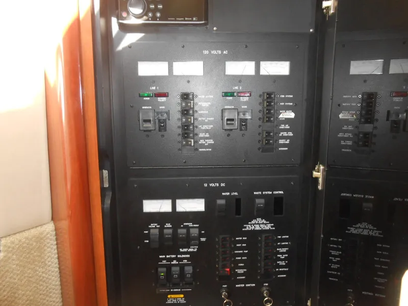 Slide: The Image of Electrical control panel on a 2005 Sea Ray 420 Sundancer yacht. - 35