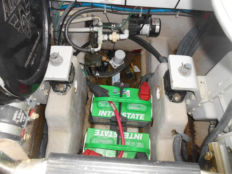 Slide: The Image of Engine compartment of 2005 Sea Ray 420 Sundancer with Interstate batteries and wiring. - 39