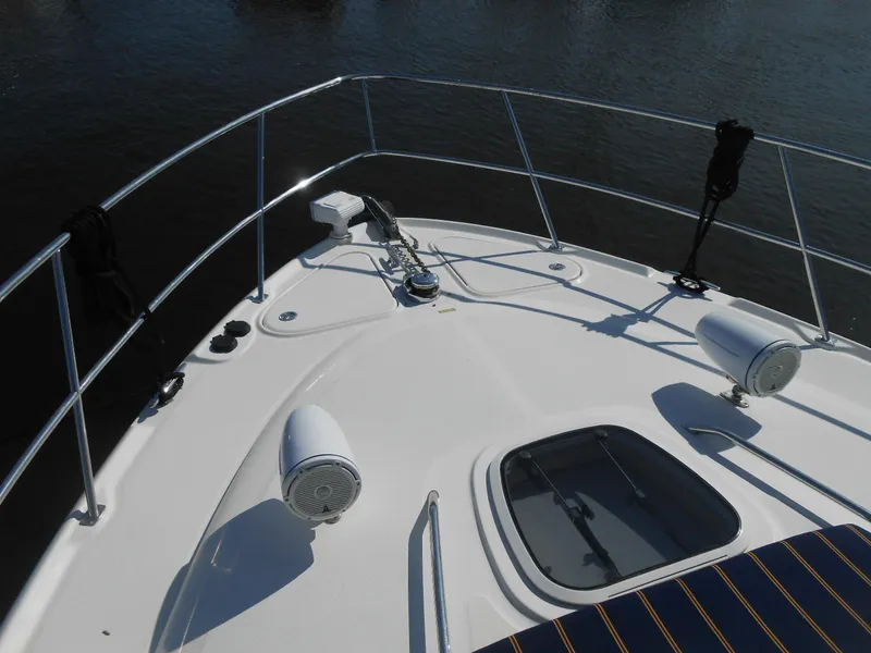 Slide: The Image of Bow of 2005 Sea Ray 420 Sundancer yacht with speakers and hatch. - 6