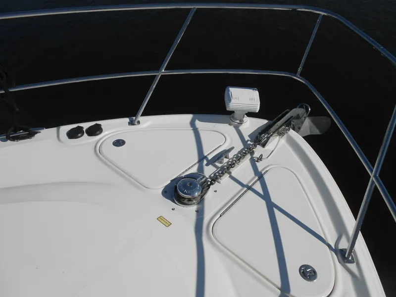 Slide: The Image of Bow of 2005 Sea Ray 420 Sundancer with anchor and railing in view. - 7