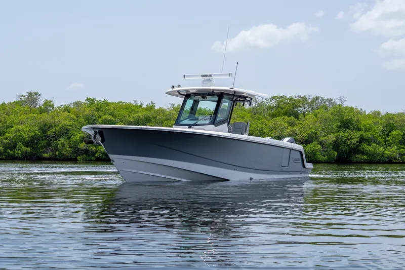 Slide: The Image of Boston Whaler 330 Outrage 2026 - 2