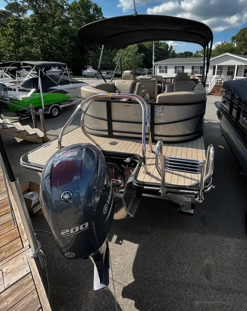 Slide: The Image of 2024 Starcraft SLS 3 pontoon boat with Yamaha 200 outboard motor. - 3