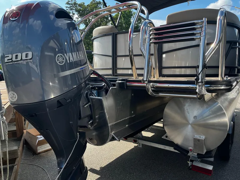 Slide: The Image of 2024 Starcraft SLS 3 pontoon boat with Yamaha 200 outboard motor. - 5