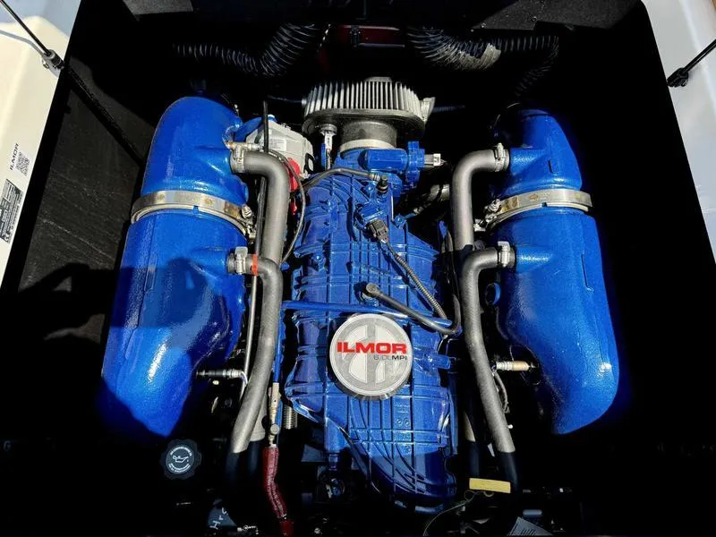 Slide: The Image of 2021 MasterCraft NXT24 Ilmor engine in blue. - 13