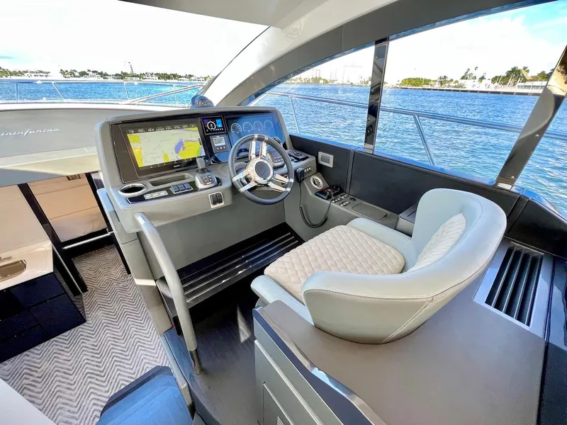 Slide: The Image of Modern helm station of 2025 Schaefer 510 Sport yacht with advanced navigation system. - 14
