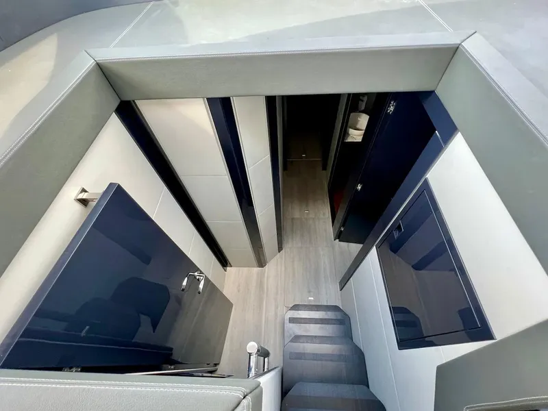 Slide: The Image of Interior of 2025 Schaefer 510 Sport yacht with modern cabinetry and sleek design. - 21