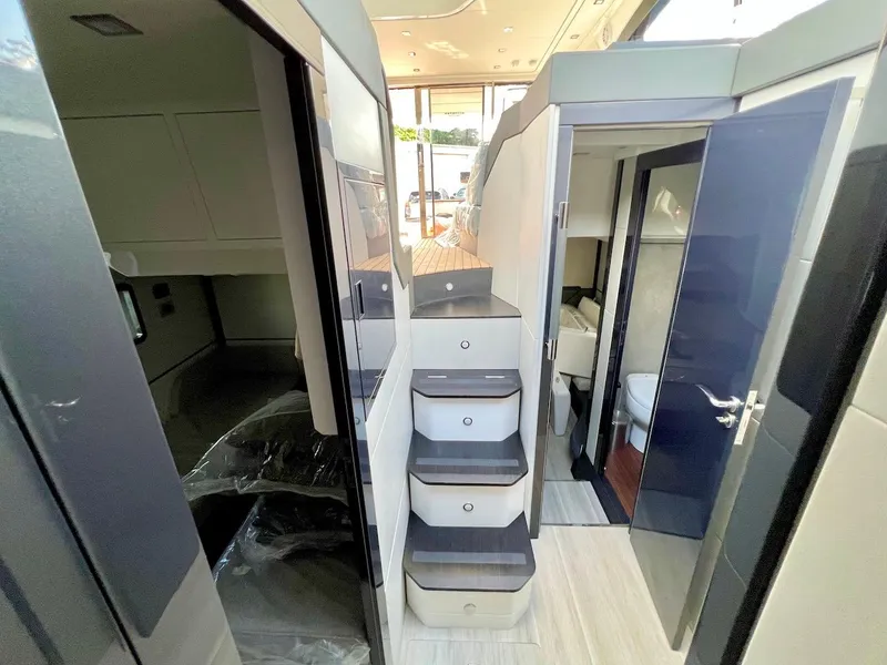 Slide: The Image of Interior of 2025 Schaefer 510 Sport yacht with modern design and compact bathroom. - 22