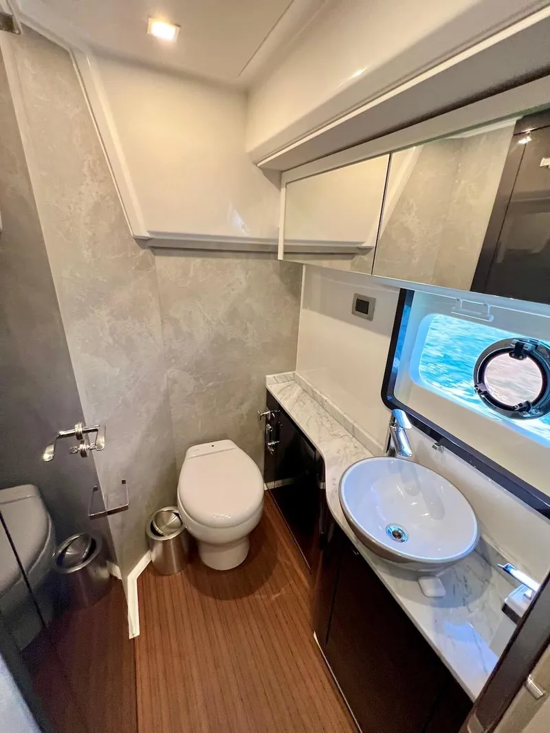 Slide: The Image of Modern bathroom in 2025 Schaefer 510 Sport yacht with sleek design and ocean view. - 25