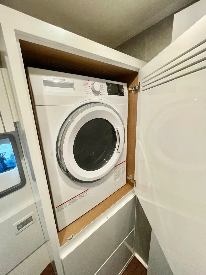 Slide: The Image of Built-in washing machine on Schaefer 510 Sport yacht, 2025 model. - 32