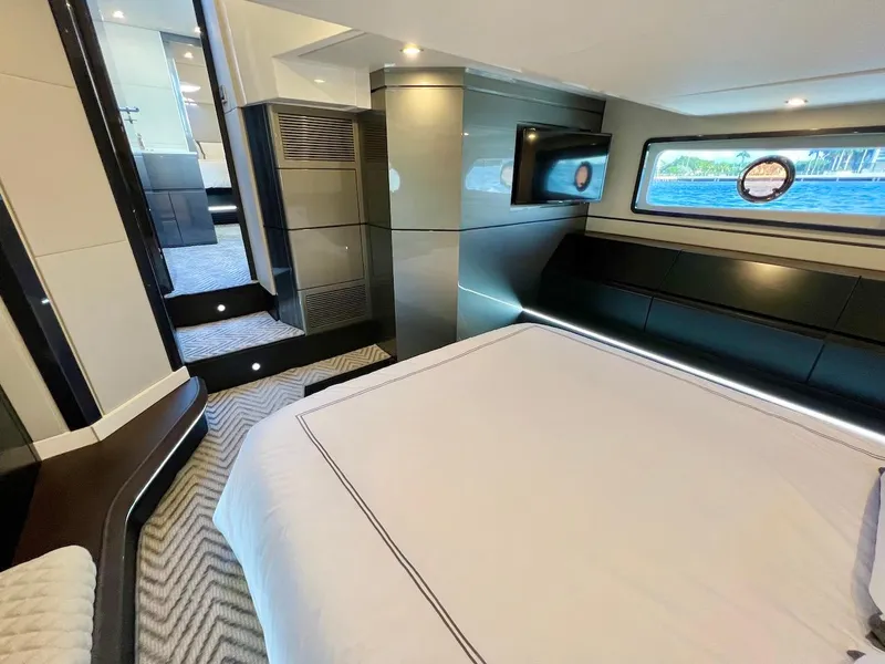 Slide: The Image of Luxurious bedroom interior of 2025 Schaefer 510 Sport yacht with modern design and ocean view. - 36