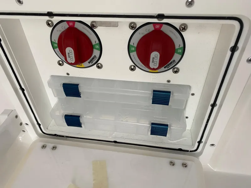 Slide: The Image of 2025 Sea Fox 268 Commander boat battery switches and fuse panel. - 13