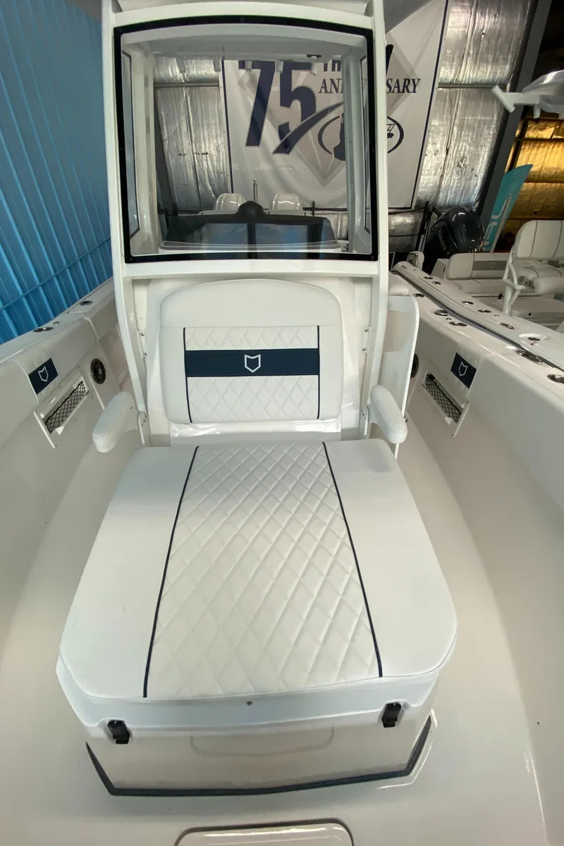 Slide: The Image of 2025 Sea Fox 268 Commander boat interior with cushioned seating and sleek design. - 24