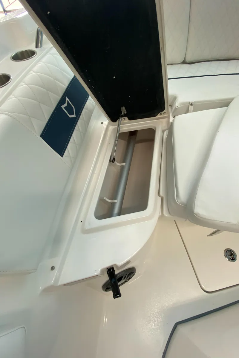 Slide: The Image of 2025 Sea Fox 268 Commander boat storage compartment with cushioned seating. - 25