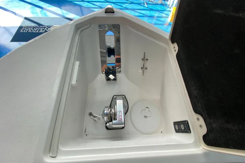 Slide: The Image of Anchor compartment of 2025 Sea Fox 268 Commander boat, featuring modern winch system. - 26