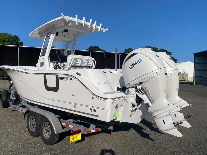 Slide: The Image of 2025 Sea Fox 268 Commander boat with Yamaha engines on a trailer. - 6