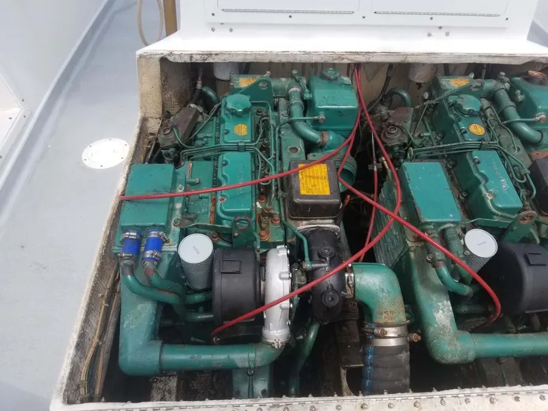 Slide: The Image of Twin green marine engines in a 1977 Pace Wahoo boat. - 13