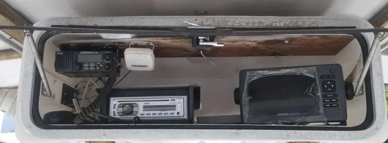 Slide: The Image of 1977 Pace Wahoo dashboard with radio, speaker, and control panel. - 17