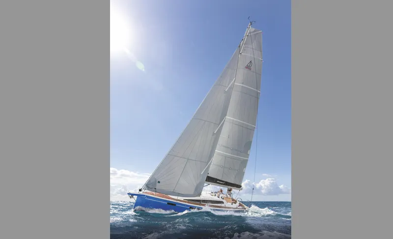 Slide: The Image of Dehler 38 SQ 2025 yacht interior cabin with red bedding and modern design. - 30