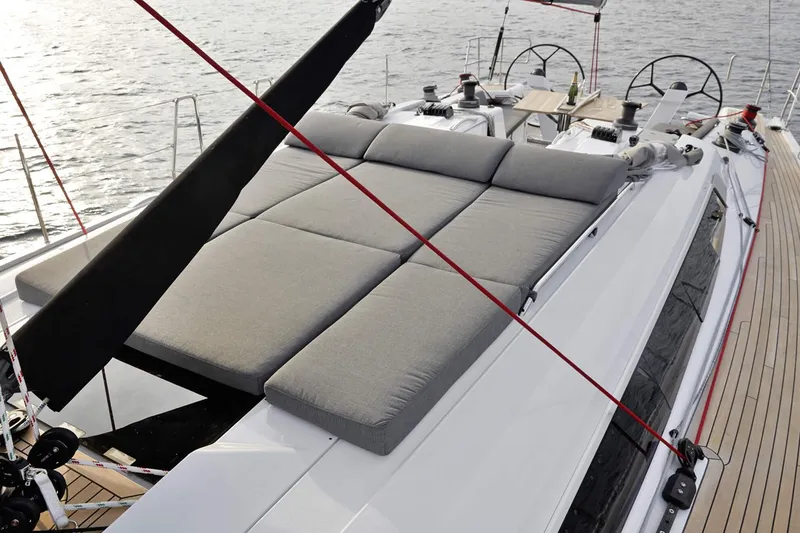 Slide: The Image of Modern interior of 2025 Dehler 46 yacht with cozy seating and dining area. - 18