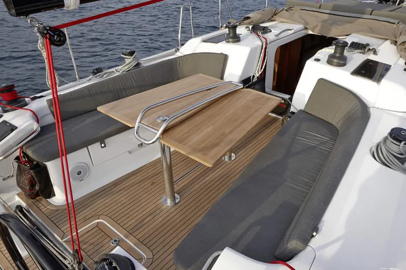 Slide: The Image of Modern interior of 2025 Dehler 46 yacht with sleek furnishings and ample seating. - 19