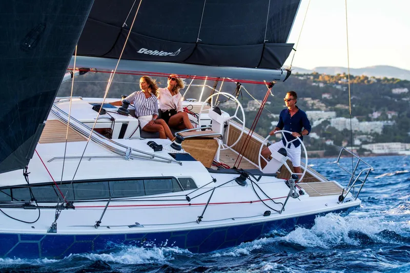 Slide: The Image of 2026 Dehler 46SQ yacht sailing with crew on a sunny day. - 43