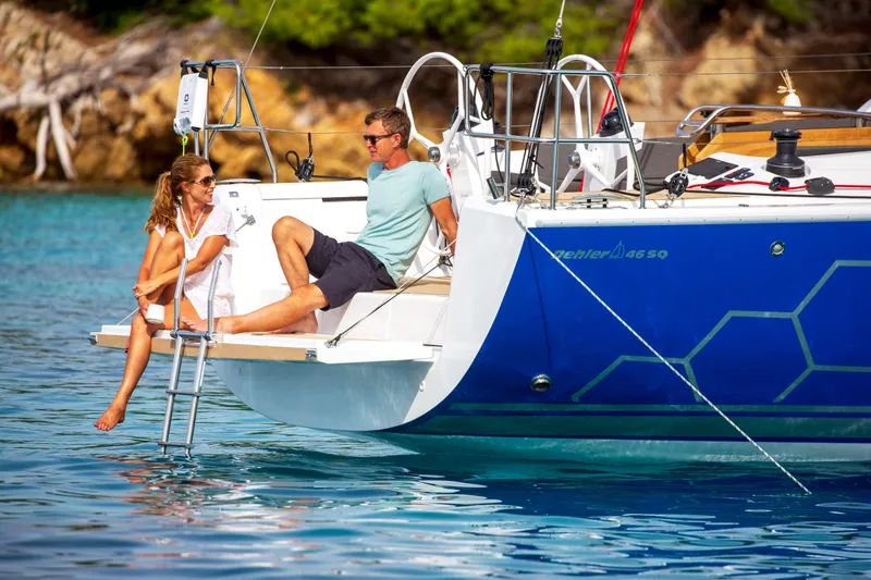 Slide: The Image of Sailing yacht Dehler 46SQ 2026 on blue ocean near lush green island. - 58