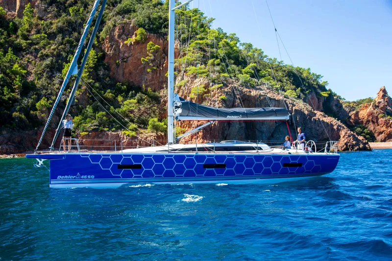 Slide: The Image of 2026 Dehler 46SQ yacht sailing on open sea with crew onboard. - 60