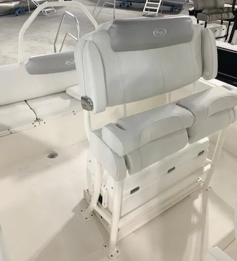 Slide: The Image of 2024 Key West 219 FS boat interior with cushioned seating. - 4