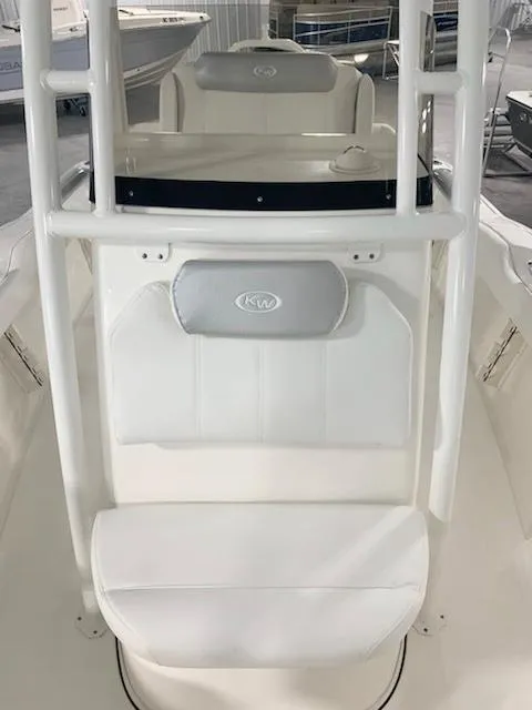 Slide: The Image of 2024 Key West 219 FS boat interior with seating and console. - 4