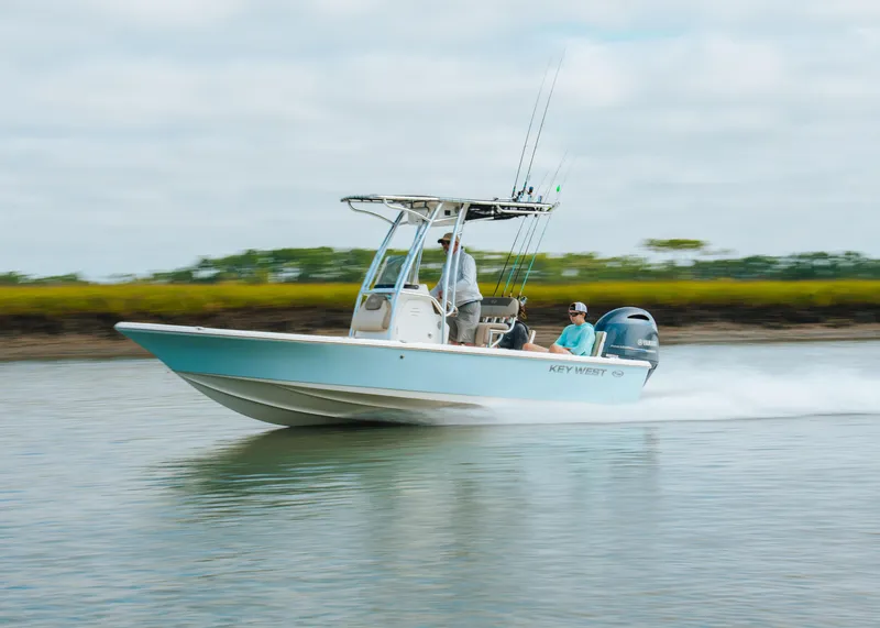 Slide: The Image of 2024 Key West 219 FS boat speeding on water. - 9