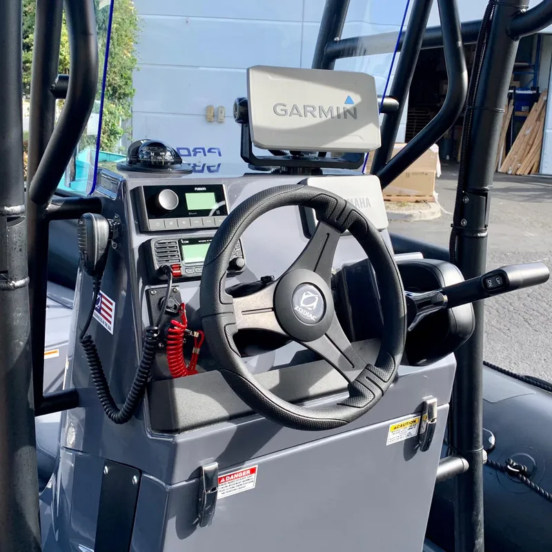 Slide: The Image of 2023 Zodiac Pro 6.5 boat console with Garmin navigation system. - 3