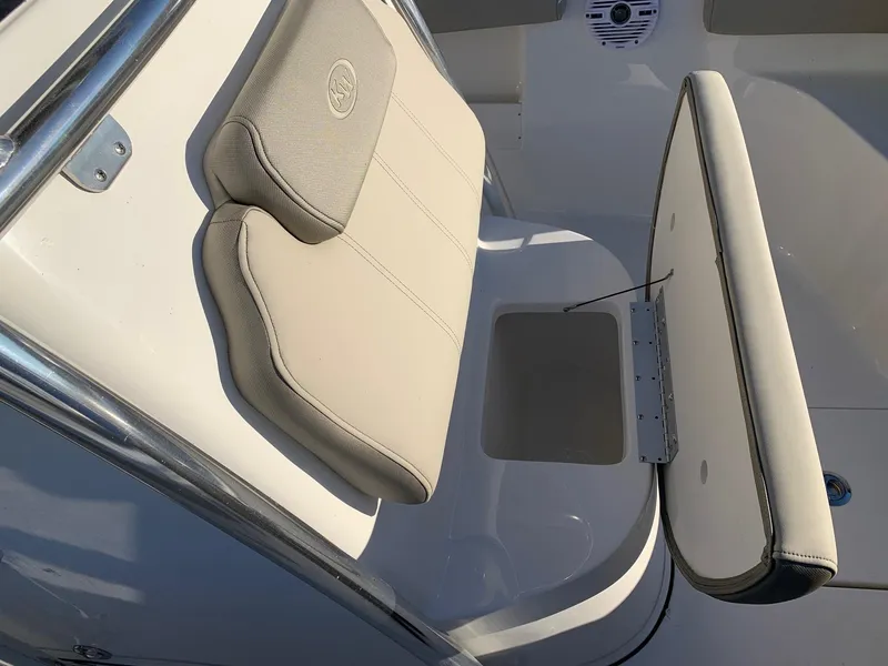 Slide: The Image of 2024 Key West 239 FS boat seat with storage compartment. - 10