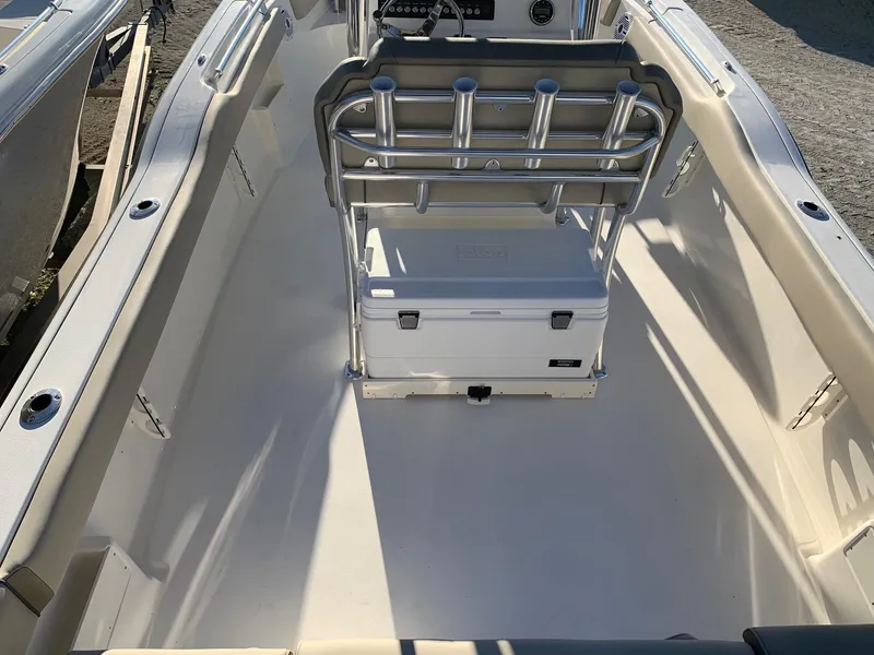 Slide: The Image of 2024 Key West 239 FS boat interior with seating and storage. - 16
