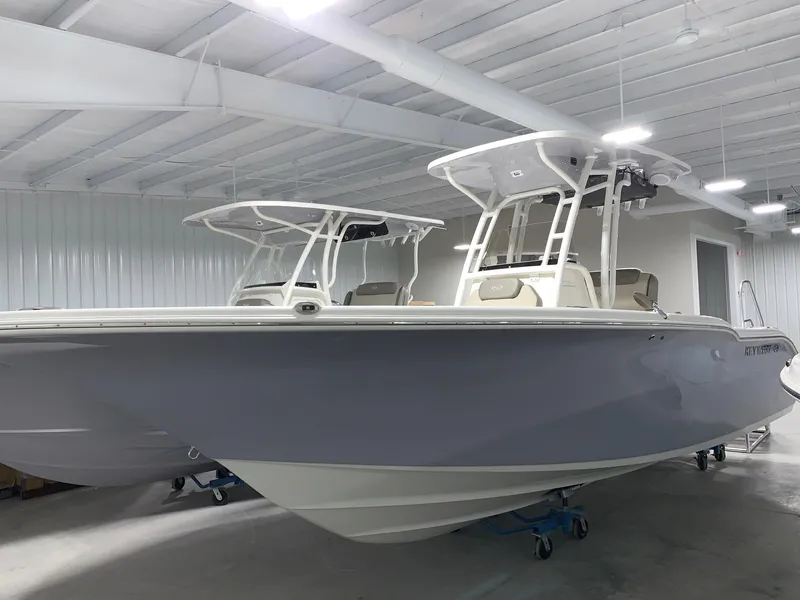 Slide: The Image of 2024 Key West 244 Center Console boat in showroom. - 0
