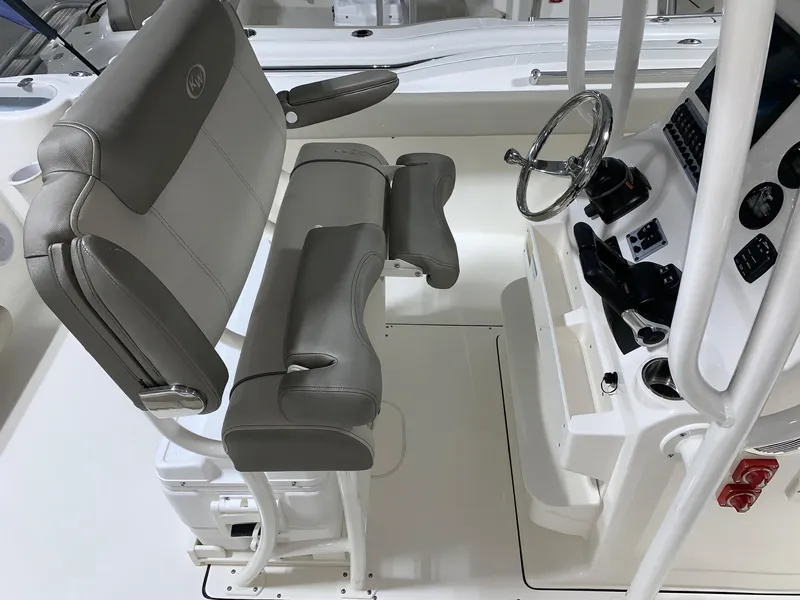 Slide: The Image of 2024 Key West 244 Center Console boat interior with helm and seating. - 11