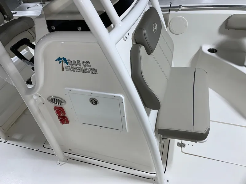 Slide: The Image of 2024 Key West 244 Center Console boat interior seating and console area. - 14